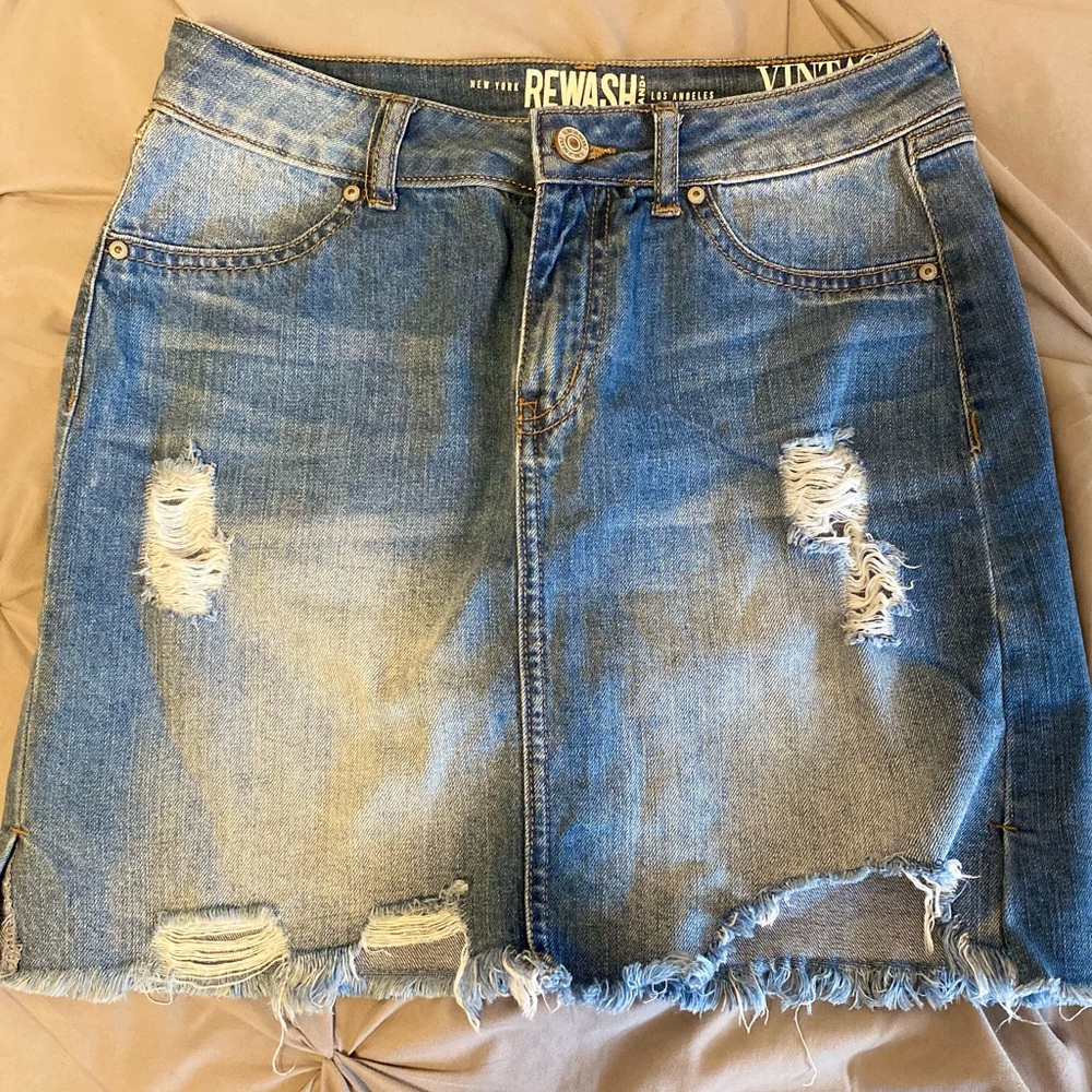 Short, ripped denim skirt